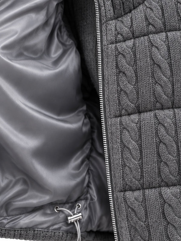 Inside of grey cashmere cable knit down vest showing the silky grey lining and drawstring hem