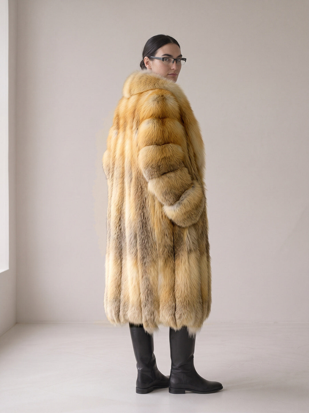 Model wearing the long golden fox fur collar coat – back view showing the full fur panels and rolled sleeves – Dolcie London